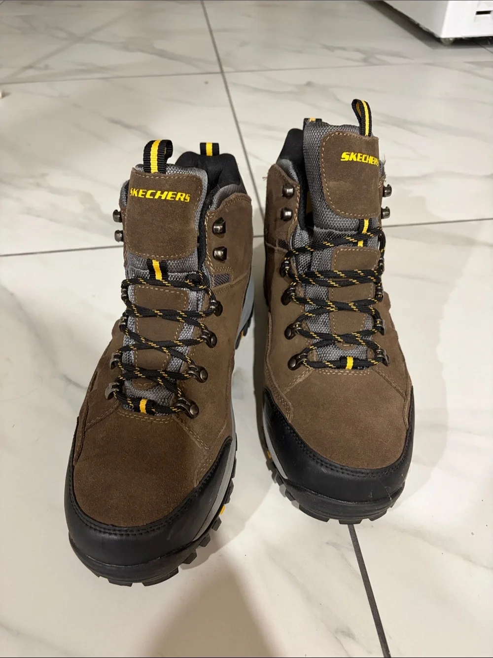 Skechers Men's Brown Trail Boots with Black and Yellow Accents